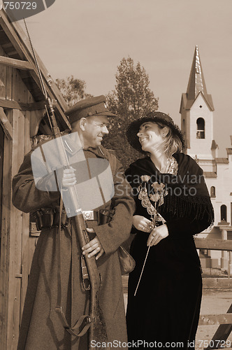 Image of Retro style picture with woman and soldier