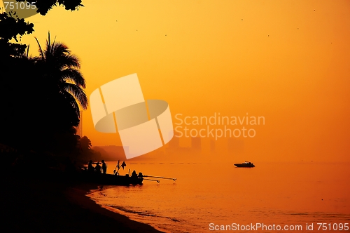 Image of Sunset on the beach.