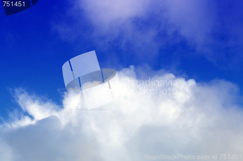 Image of dark cloud on blue sky