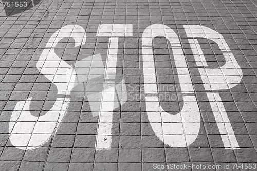 Image of Stop Painted on Road