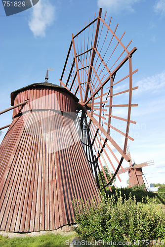 Image of Two Red Wooden Mills