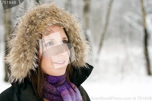 Image of Woman in forest with fur hood