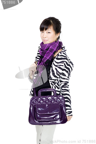 Image of Stylish asian girl with purple bag and scarf