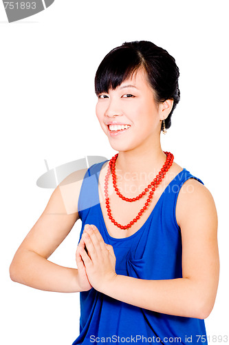 Image of Asian woman praying