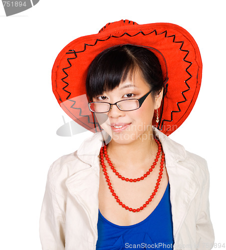 Image of Asian woman in big red hat