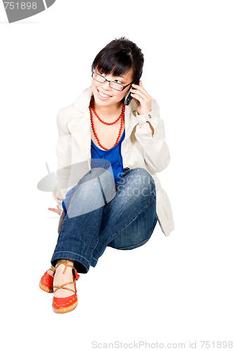 Image of Asian girl speakin on cell phone