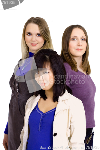 Image of Three women standing close