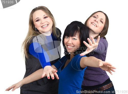 Image of Three women trying to get something