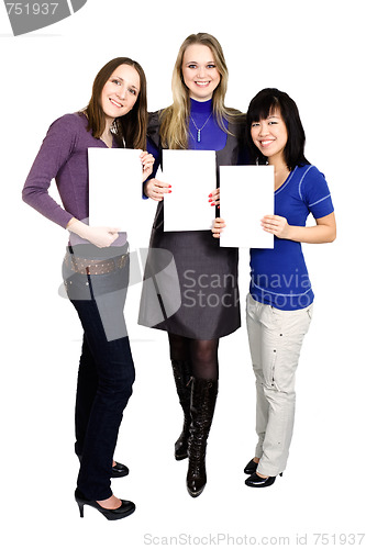 Image of  Three women holding white paper