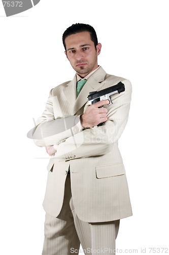 Image of Mafia with arms crossed and a gunon hand