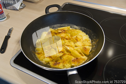 Image of Potatoes roasted in frying pan.