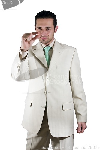 Image of Businessman pointing out little importance