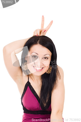 Image of Woman gesticulating horns