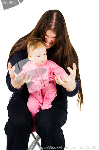 Image of Lovely child and fearful long hair rocker