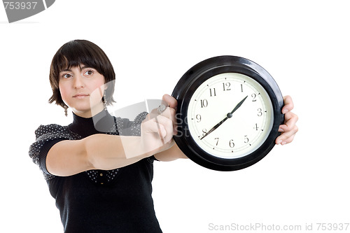 Image of Cacasian woman holding wall clock