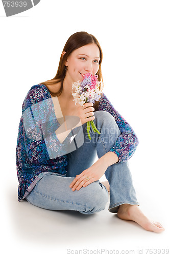 Image of Happy woman with flowers