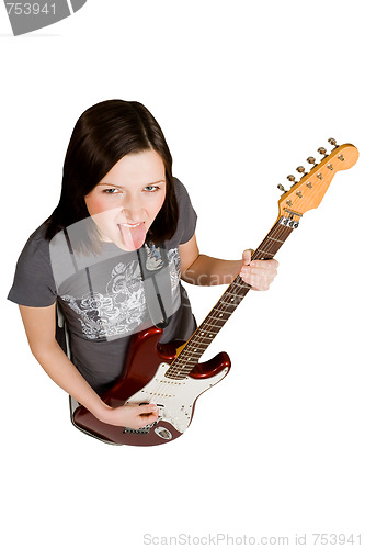 Image of Woman playing on electric guitar