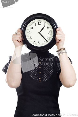 Image of Cacasian woman holding wall clock