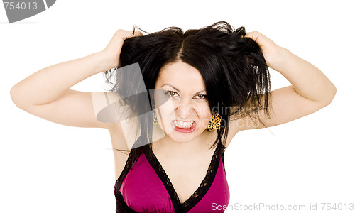 Image of Angry woman holding hair