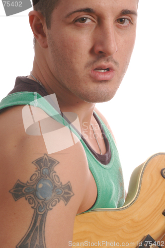 Image of guitarist with large tattoo 2497