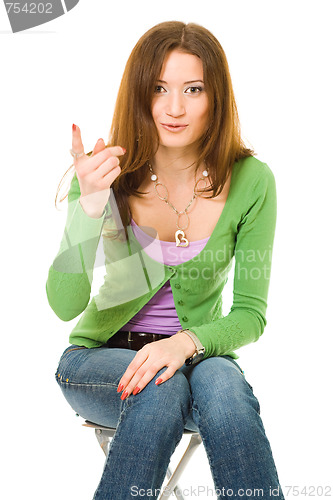 Image of woman gesturing pointing up