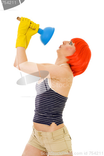 Image of Shocked woman with cleaning tool