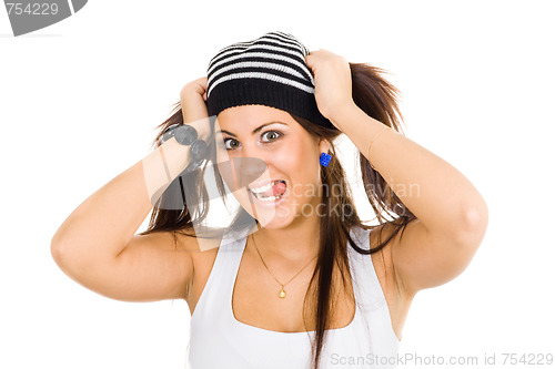 Image of Young woman holding her ponytails