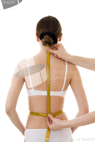 Image of Measuring woman's back