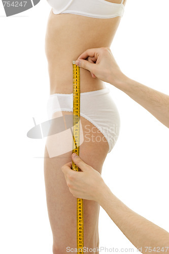 Image of Measuring woman's hips size