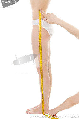 Image of Measuring woman's leg length