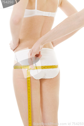 Image of Measuring woman's buttocks size