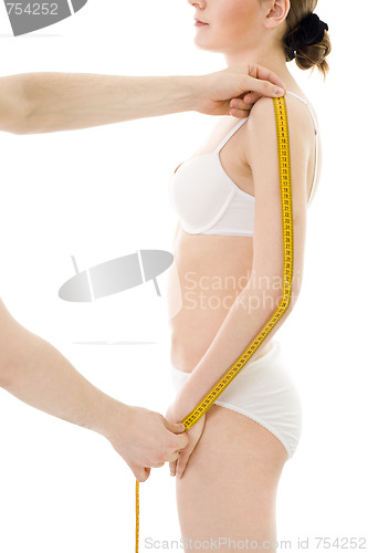 Image of Measuring woman's arm length