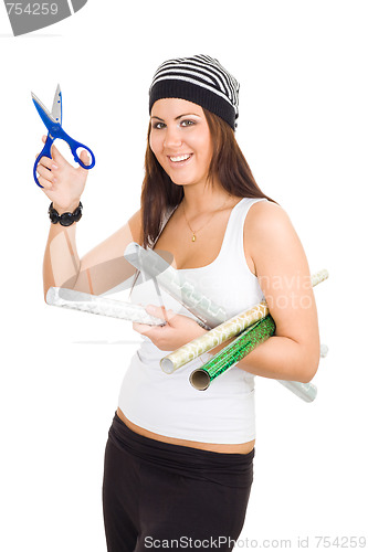 Image of Woman holding scissors and package paper