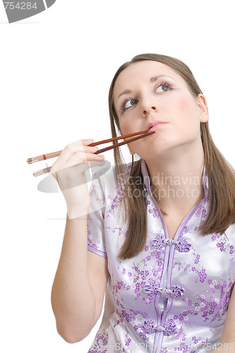 Image of Woman with chopsticks for sushi