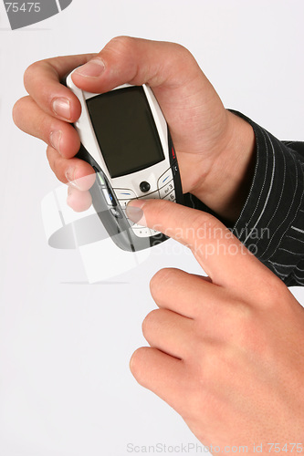 Image of Dialing on a cellular phone