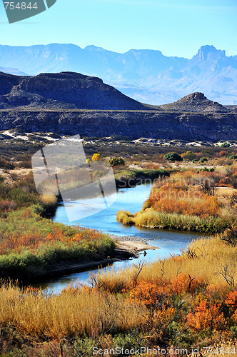 Image of Image of winding stream in front of mountains