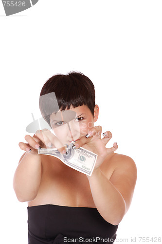 Image of Attractive woman takes lot of 100 dollar bills