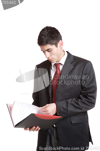 Image of Confident businessman with notebook