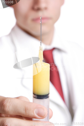 Image of doctor holding syringe