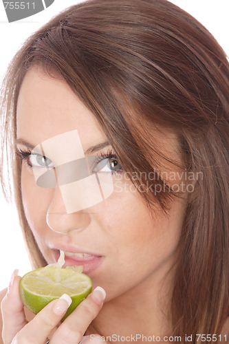 Image of happy model eating a Lemon