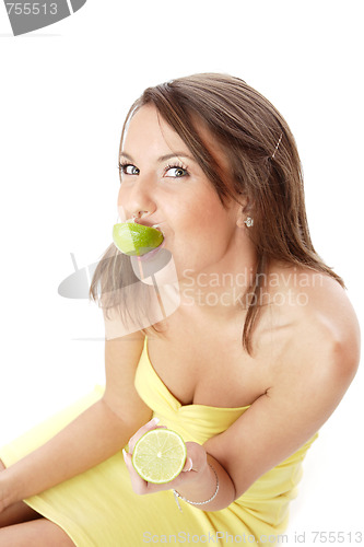 Image of happy model eating a Lemon