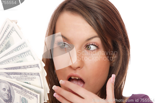 Image of Attractive woman takes lot of 100 dollar bills