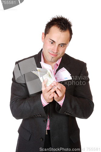 Image of Portrait of a business man holding money 