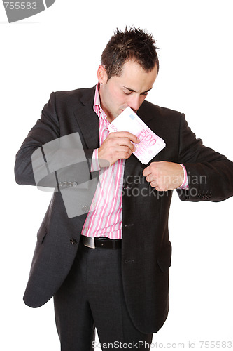 Image of Portrait of a business man holding money 