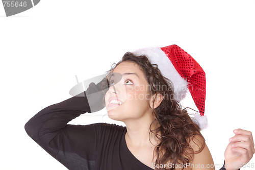 Image of young woman wearing christmas hat