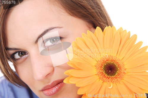 Image of Beautiful woman with flower isolated on white