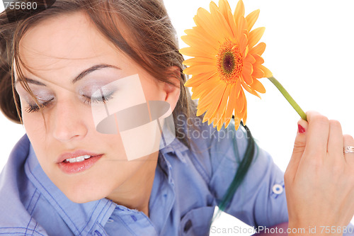 Image of Beautiful woman with flower isolated on white