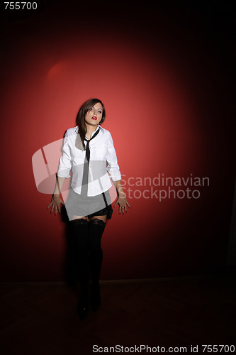 Image of sexy women on red background