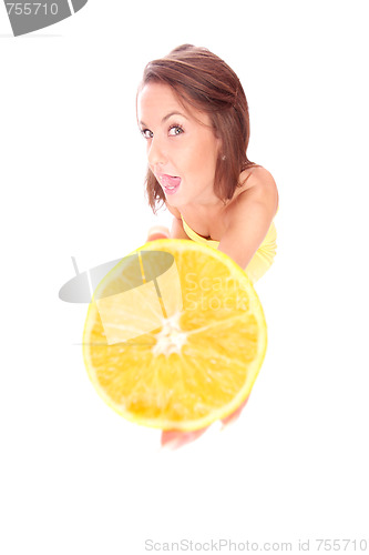 Image of happy model eating an orange