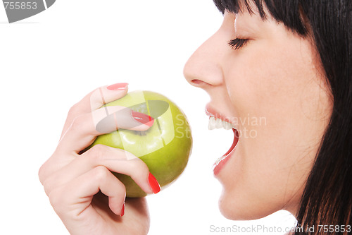 Image of A pretty young woman holding an apple 